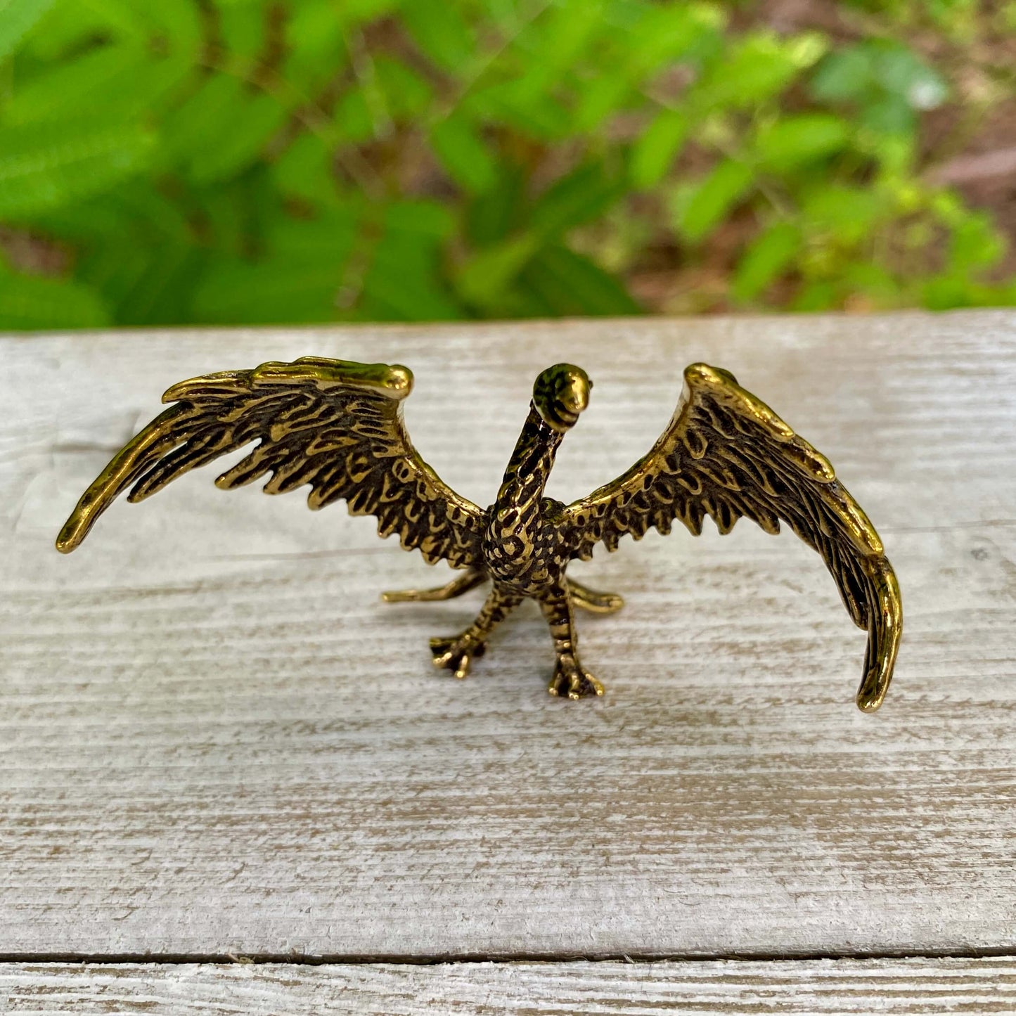 Solid brass phoenix sculpture – handcrafted mythical bird art for collectors, spiritual spaces, and fantasy-inspired home decor.