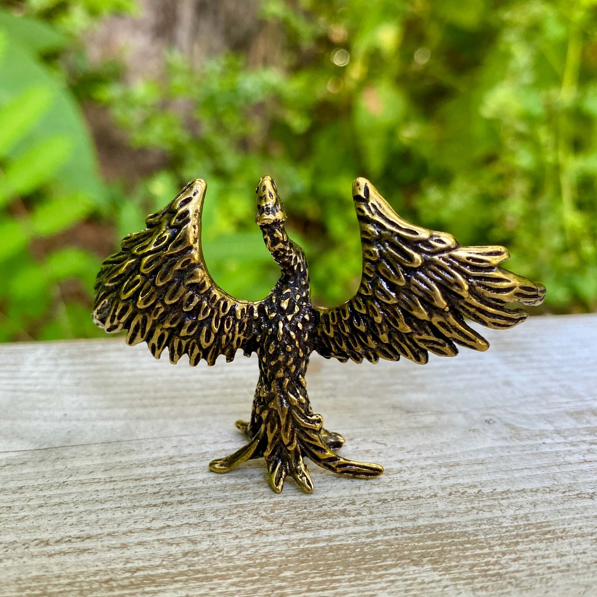 Capture the power of transformation with this handmade brass phoenix. A meaningful piece symbolizing rebirth and rising from the ashes.