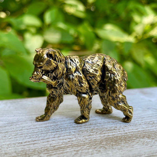 Solid brass grizzly bear sculpture, handmade with fine detail. Ideal for cabin decor, nature-inspired collections, or wildlife-themed gifts.